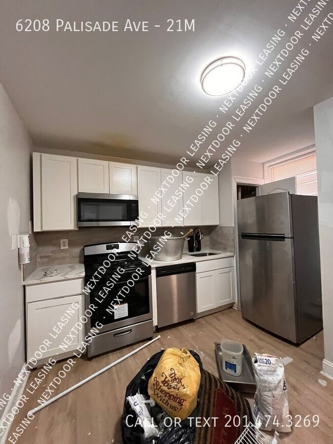 Building Photo - 6208 Palisade Ave Unit 21M