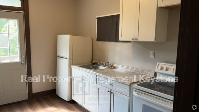 Building Photo - 122 E 16th Ave Rental