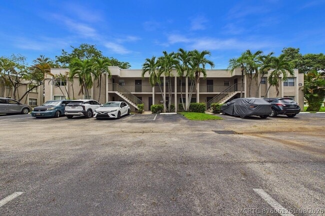 Building Photo - 8511 Old Country Manor Unit 401
