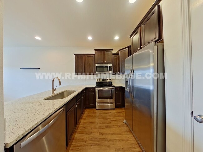 Photo - Modern 3-Bedroom Townhome with Stylish Upd...