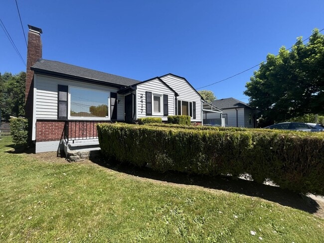 Photo - Bright and Welcoming Home with Modern Kitchen, Expansive Backyard & Flexible Living Space