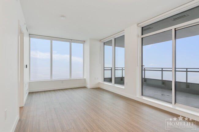 Photo - Welcome to Flamingo One, a landmark tower in Surrey Central! Unit 3108