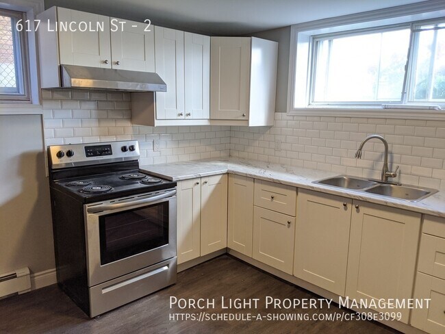 Photo - Bright and Sunny 2 Bedroom Basement with Yard, Parking and Tons of Storage Unit 2