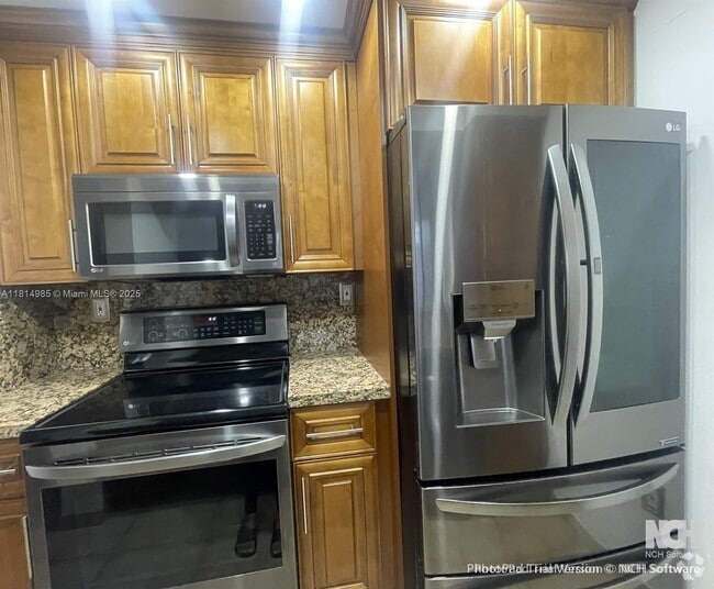 Building Photo - 7035 NW 186th St Unit D407 Rental