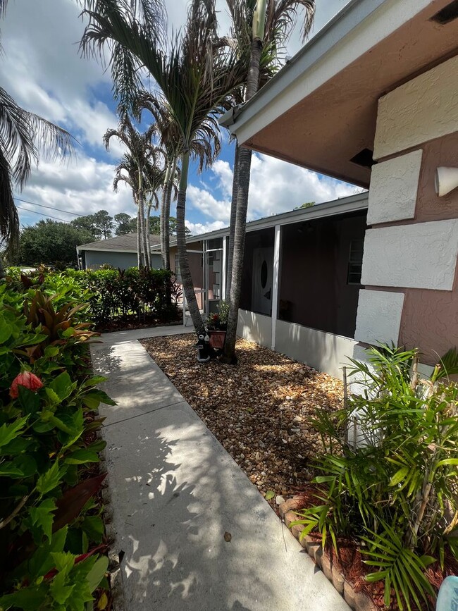Photo - 3 BEDROOM 2 BATH CONVENIENTLY LOCATED WITH A TROPICAL OASIS IN THE BACK YARD!