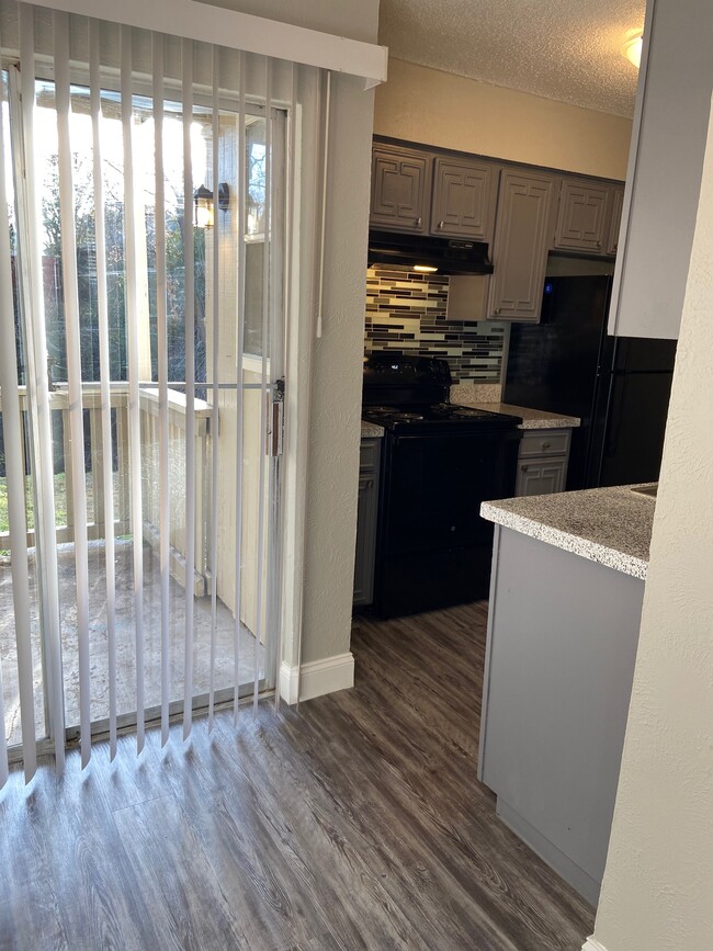 Patio. - Summer Creek Apartments