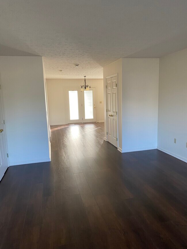 Living room looking into dining room. - 717 Terrace Ct Unit 717 Terrace Ct