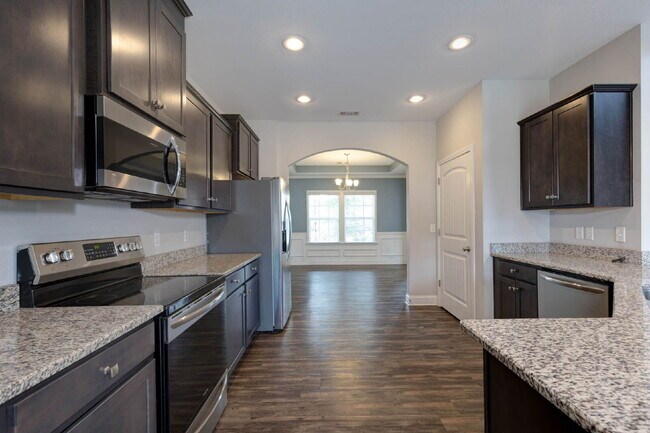 Photo - 4BR/3.5BA · 2,809 SF · Owner's Suite on Main · Fenced Yard · Midland, GA — $2,800/mo