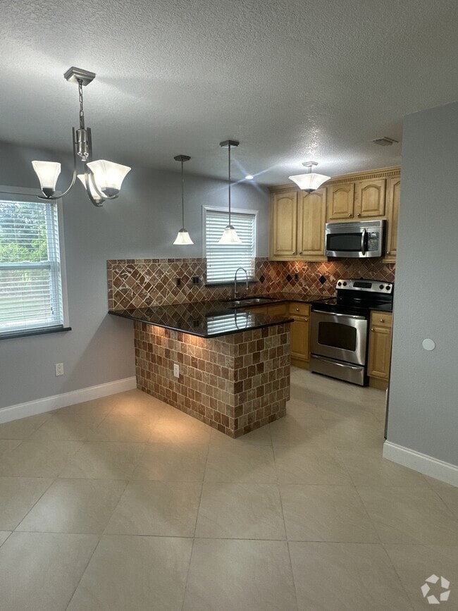 Building Photo - 7210 N Manhattan Ave Unit 1621 Rental