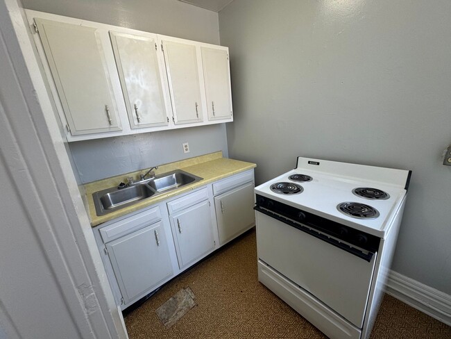 Photo - 1 Br small living room and small kitchen Unit Apt #8