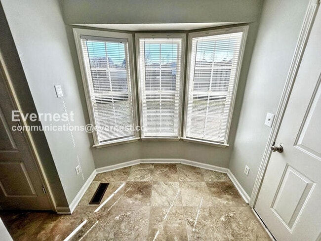 Photo - Spacious 3 Bed, 2 Bath Home with Deck, Patio, and Attached Garage