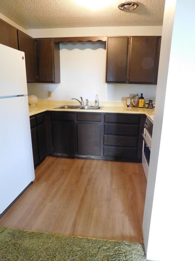Huge Kitchen has new appliances and new LVP flooring.