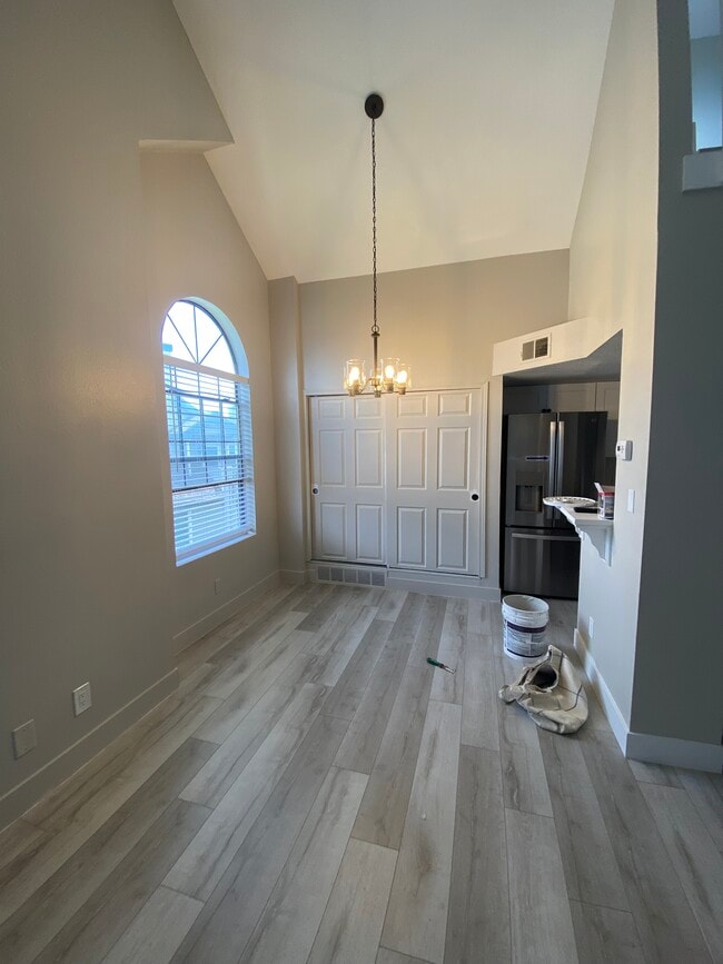 Kitchen area from living room - 8341 S Upham Way Unit The Reef