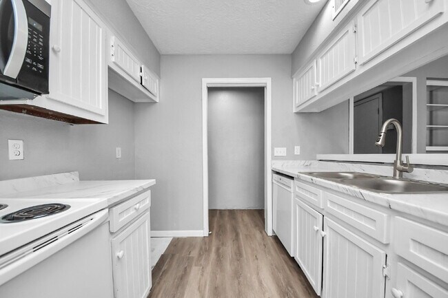 Photo - No Carpet. Private Yard. Extra Storage. What More Could You Ask For? Unit A