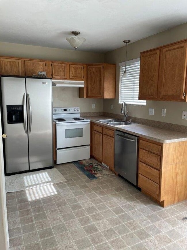Photo - Move-In Ready 5-Bed with Garage, Yard & Up...