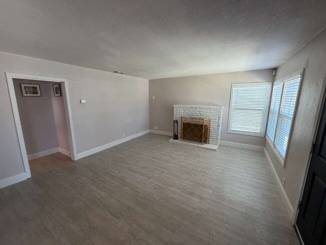 Photo - "Charming 3-Bedroom Oasis with Granite Elegance & Hardwood Warmth in Concord!"