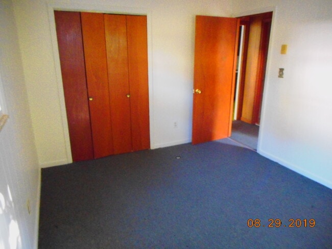 2nd bedroom carpet is in progress of being replaced with laminate flooring - 107 Carolina Ave Unit Apt B