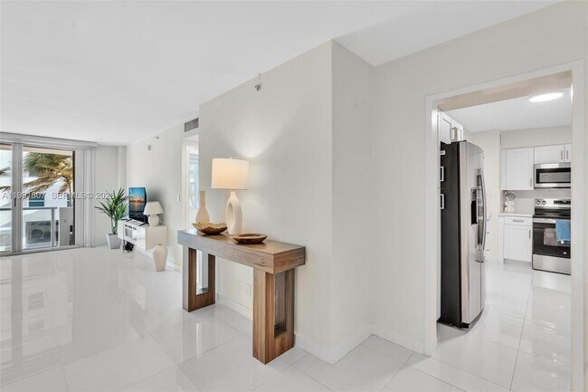 9195 Collins Ave Unit 303