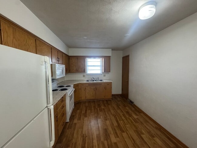 Photo - ***6 OR 12 MONTH  LEASE OPTIONS***4BR 2BA Home w/ Central Air • Porch • Great Location in Indepen...