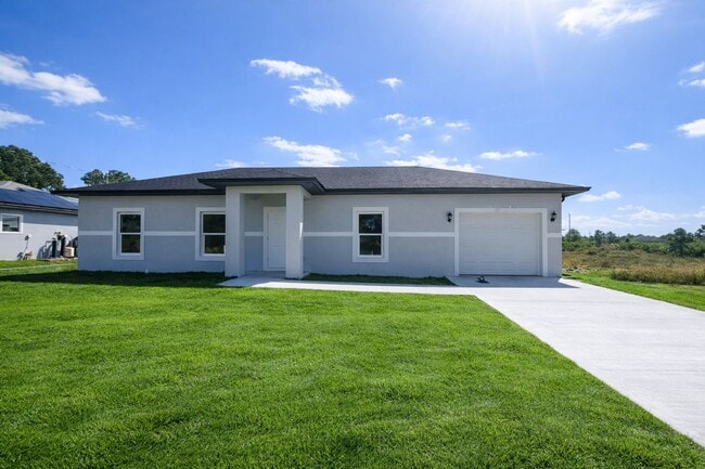 Building Photo - NEW CONSTRUCTION- Modern 3 Bed / 2 Bath Home in E Lehigh Acres