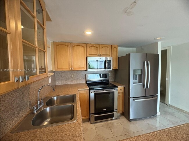 Building Photo - 5625 W 26th Ct Unit 201 Rental