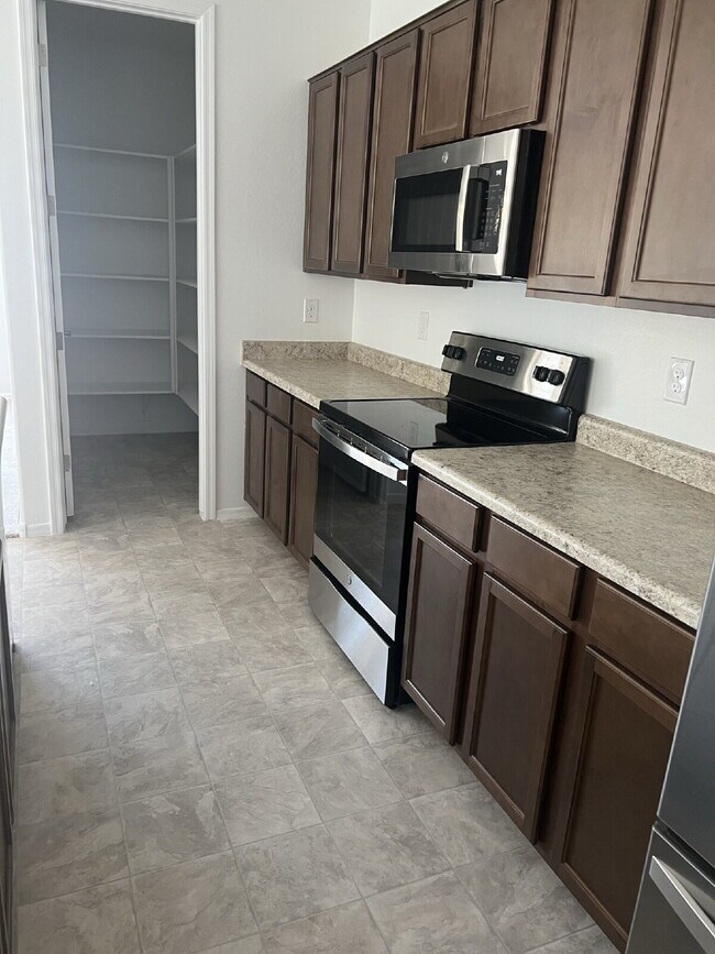 Photo - 4 BEDROOM RENTAL WITH 3 CAR GARAGE IN LOS PORTALES CASA GRANDE ARIZONA
