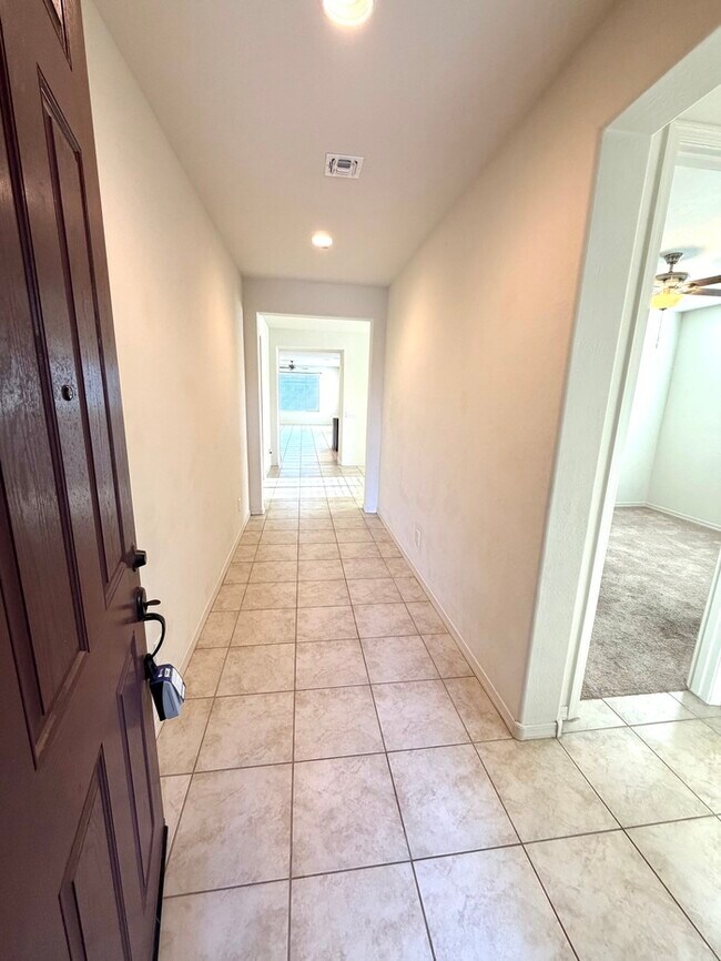 Photo - Beautiful 4BR/3BA single-story home in Harvest Queen Creek! Built in 2021 with 2,306 SF, den, che...