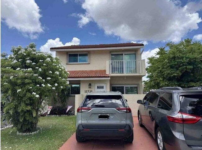Photo - 11711 SW 13th St Townhome