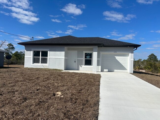 Photo - Brand-New Modern 2BR/2BA Home with Garage- In Serene Lake Placid Location
