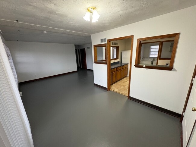 Photo - Lovely & Spacious 4-Bed, 2-Bath Single-Family Home Near Everything You Need