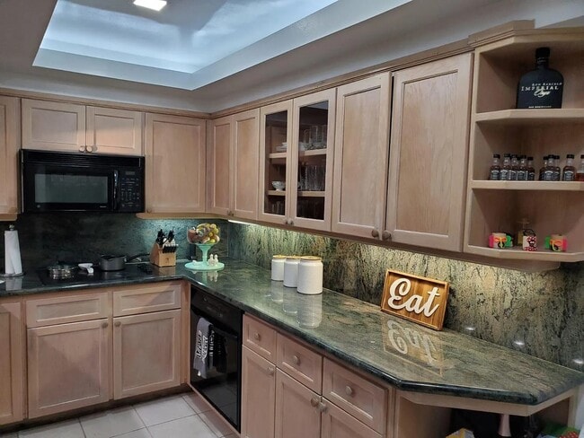 Building Photo - 7732 Camino Real Unit F-319