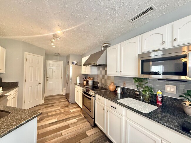 Photo - Charming 3BD, 2.5BA Raleigh Home with a Fenced Yard With Easy Access to Downtown Raleigh and Near...