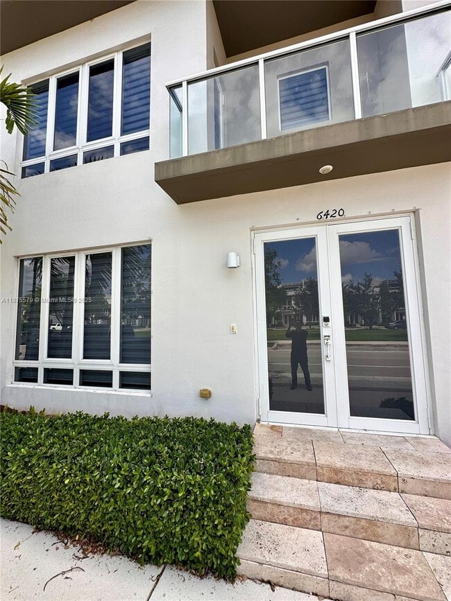 Building Photo - 6420 NW 104th Path Unit 6420 Rental