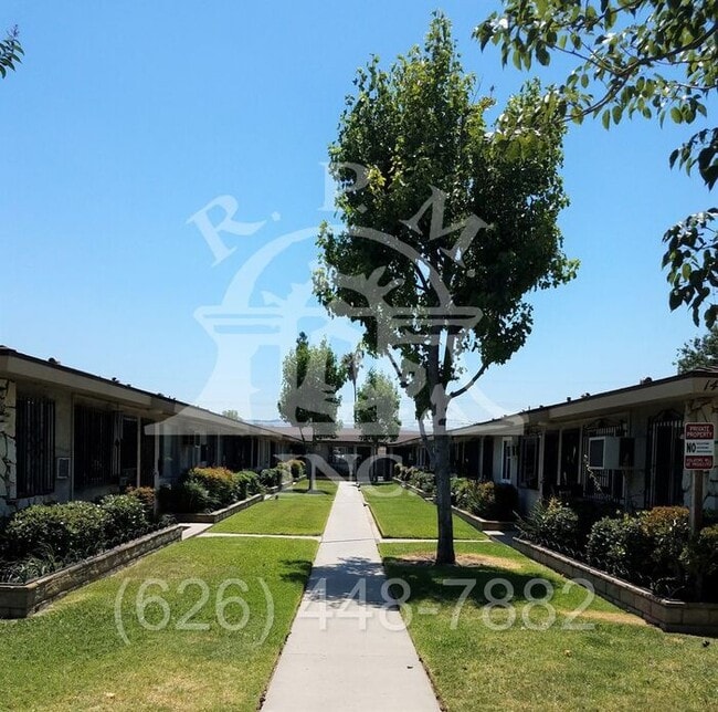 Building Photo - Garden Style Walk Up Single Level Condominium in La Puente Unit APT Q