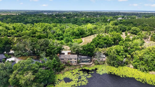 Photo - Available Now! Waterfront Living at Its Best – Pool, Decks & Gated Privacy