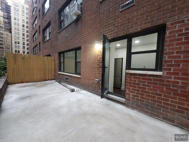 Building Photo - 405 E 56th St Unit 1G Rental