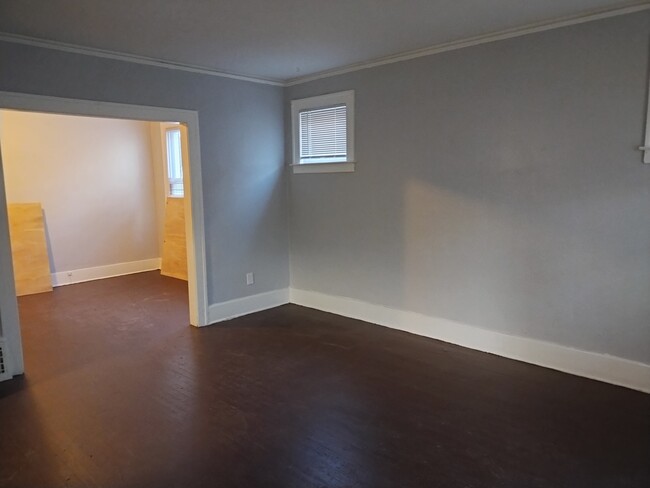 Spacious living room - 5354 Oregon St Apartments Unit 1W