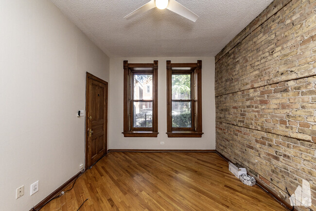 Building Photo - 1036 N Honore St Unit 1f Rental