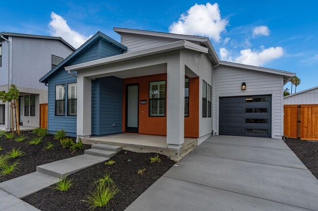 Photo - Bright and Beautiful 3 bedroom 2 full bathroom Home! Attached two car tandem garage with large en...