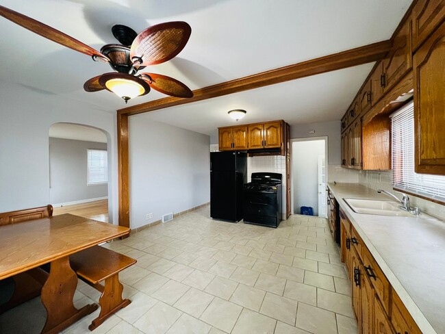 Photo - Elegant 4-bedroom Home with Chef’s Kitchen, 2 Full Bath, and Two-Car Garage