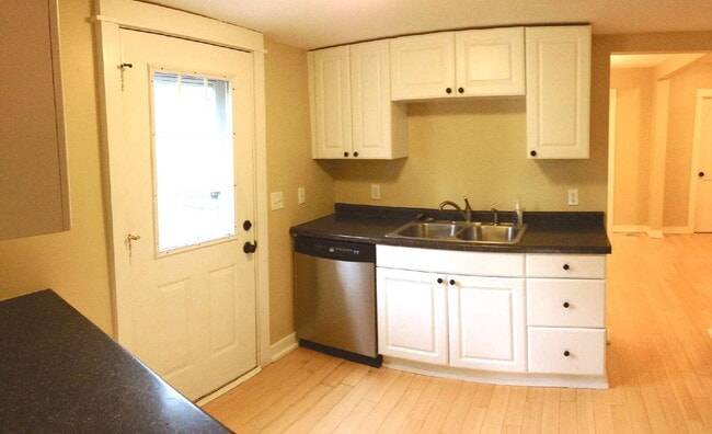 Photo - Spacious 4-Bedroom Retreat with Elegant Hardwood Floors in Minneapolis