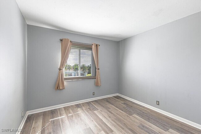 Building Photo - 2885 Palm Beach Blvd Unit 307