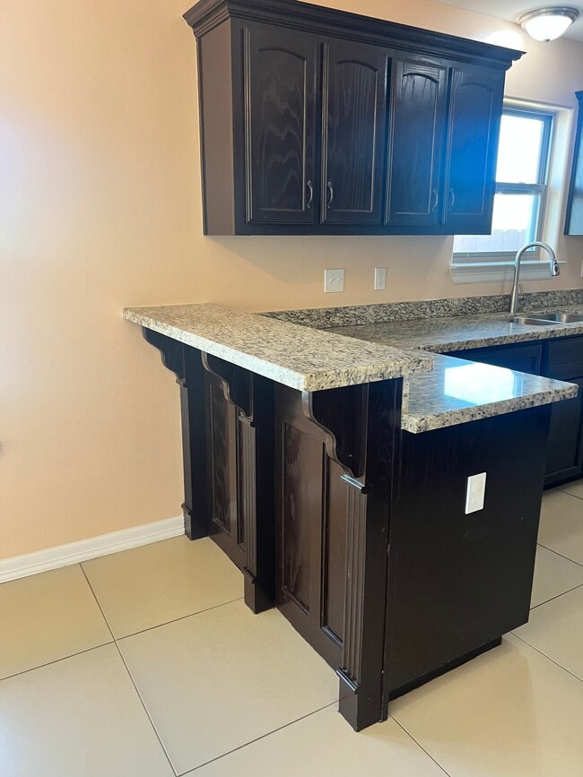Granite countertops - 700 E Juarez Ave