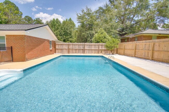 Building Photo - Completely Remodeled 3BR Home on Nearly an Acre with In-Ground Pool, Pool Service Included & Huge...