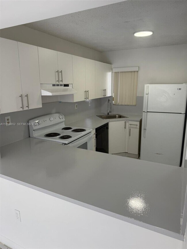Photo - 2680 W 76th St Unit 204