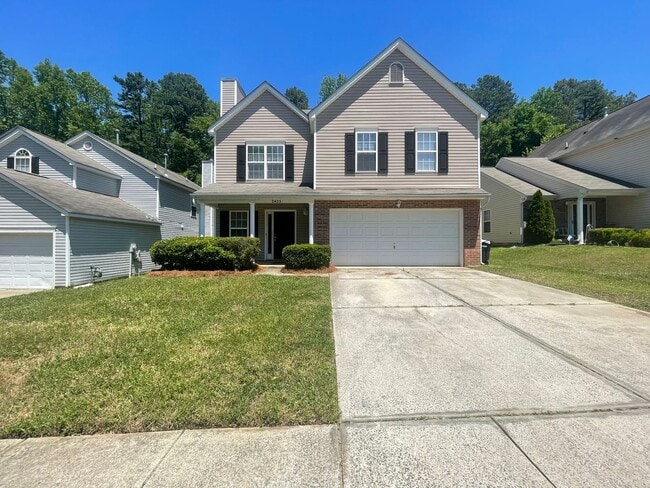 Building Photo - Come take a look at the gorgeous newly renovated 4 bedroom, 2.5 bath, 2 car garage home located i...