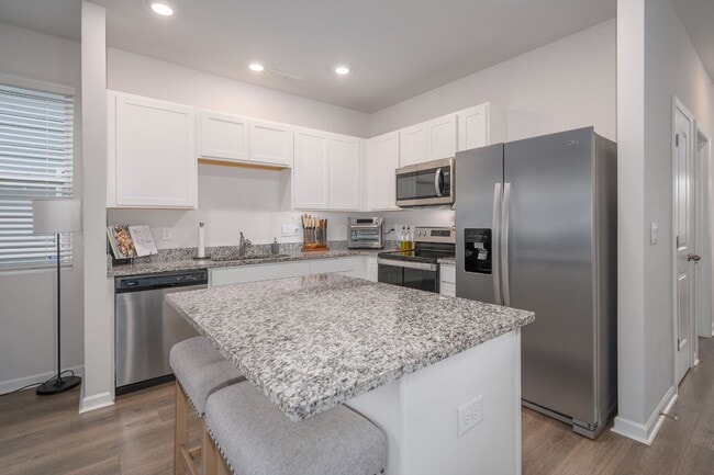 Photo - Bright 3-Bed End-Unit Townhome in Cedar Station with Modern Finishes & Private Outdoor Spaces