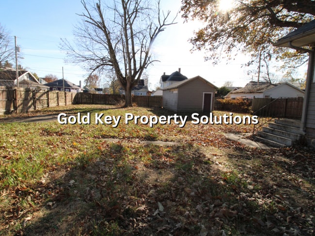 Photo - 2 BR 1 BA House with Fenced Backyard, Basement, and Garage NO SECTION 8