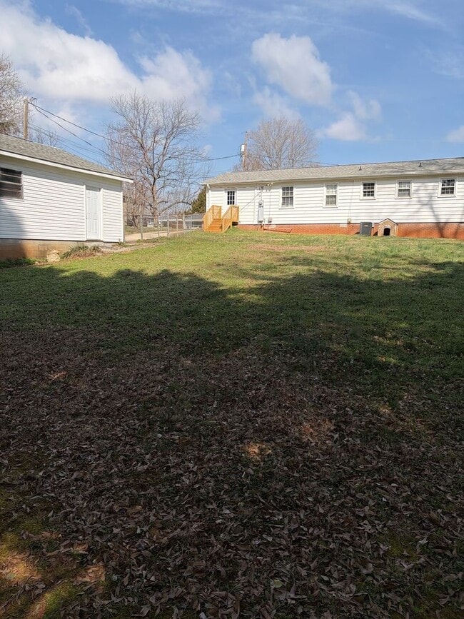 Photo - FENCED IN YARD AND LARGE DETACHED TWO CAR GARAGE LOCATED IN THE DESIRED TRAVELERS REST!!!