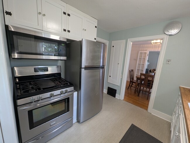 Gas range and built-in microwave with exhaust fan